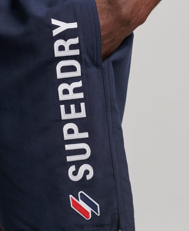 il Superdry גברים מכנסי ים ממוחזרים 19 אינץ' אפליקציית חיל הים 4LX2Z409 הַלבָּשָׁה