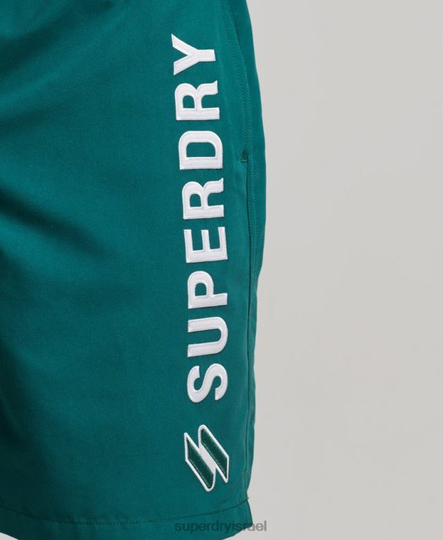 il Superdry גברים מכנסי ים ממוחזרים 19 אינץ' אפליקציית ירוק 4LX2Z452 הַלבָּשָׁה