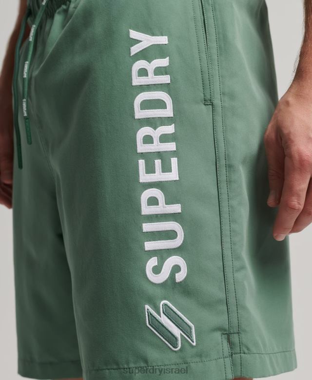 il Superdry גברים מכנסי ים ממוחזרים 19 אינץ' אפליקציית ירוק 4LX2Z56 הַלבָּשָׁה